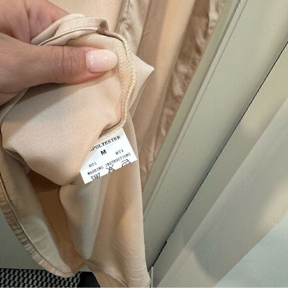 Elegant Sleeveless Cream Dress - Picture 5 of 8